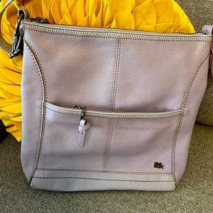 the sak crossbody leather bag. Rosewood. Main zipper closure, one front zipper